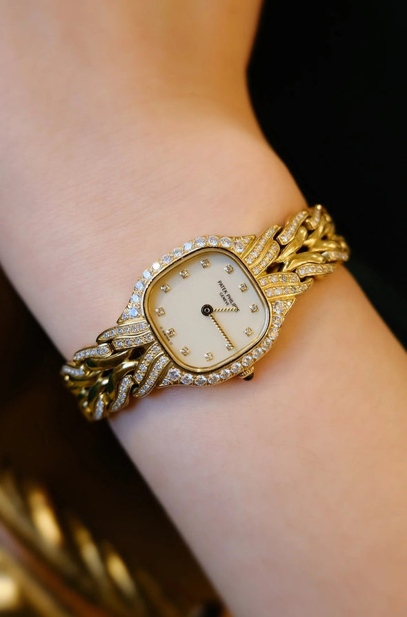 Patek Philippe 18ct gold La Flamme bracelet watch