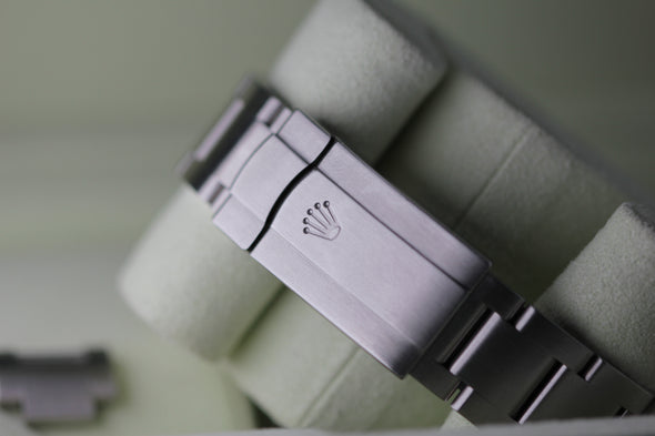 Rolex Oyster Perpetual 116000 Silver Dial Full-Set Watch Made in 2014