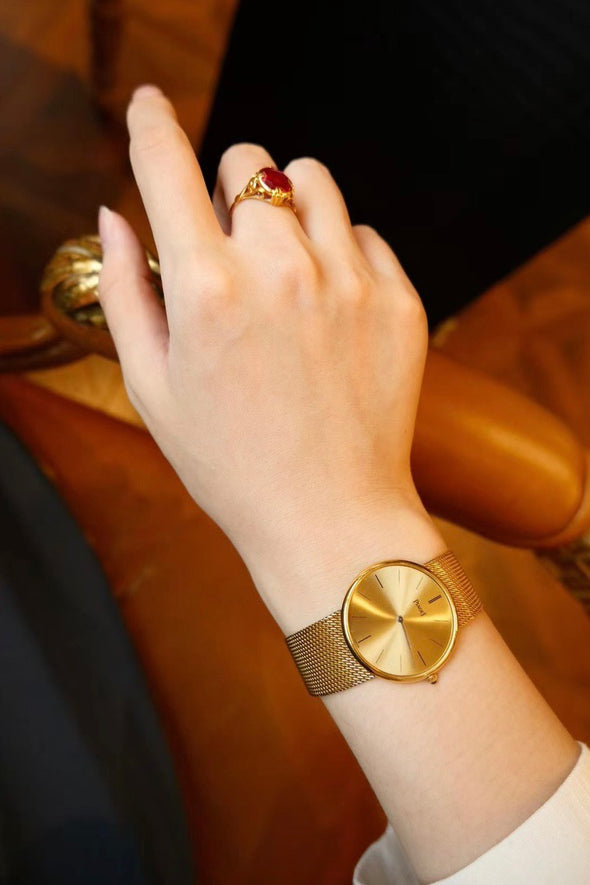 Piaget Classic 18k Gold Sunburst Dial Watch