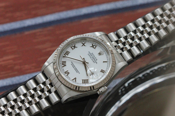 Rolex Datejust 36 White Roman Dial With 18k White Gold Fluted Bezel. Ref: 16234 fully serviced by RSC with warranty remaining