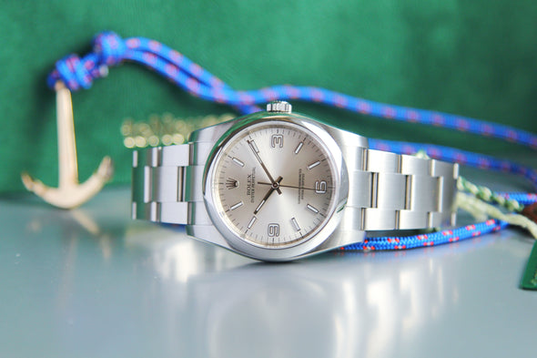 Rolex Oyster Perpetual 116000 Silver Dial Full-Set Watch Made in 2014