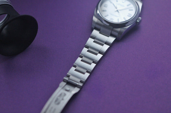 Rolex Oyster Perpetual 116000 Silver Dial Full-Set Watch Made in 2014