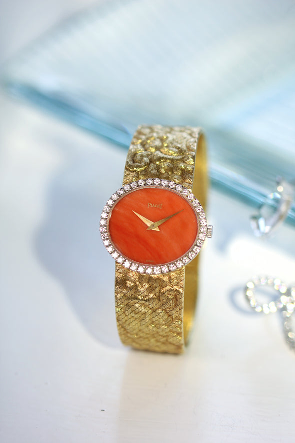 Piaget Orange dial 18 Karat Gold cocktail watch 1970S