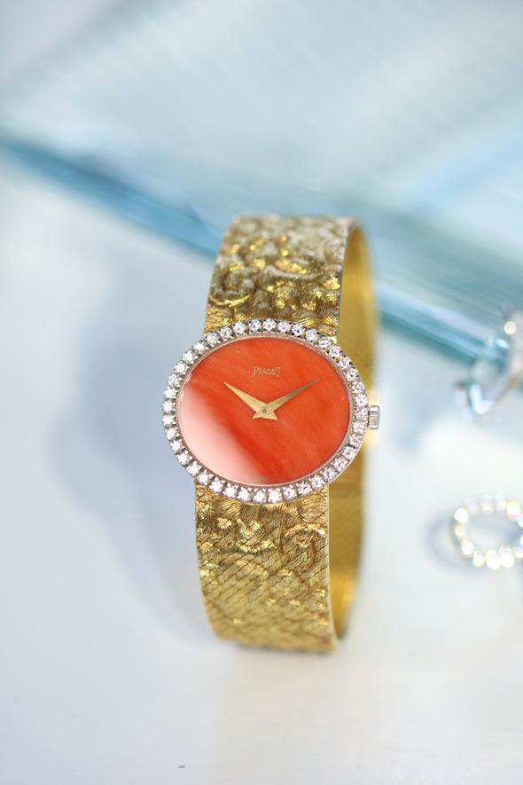 Piaget Orange dial 18 Karat Gold cocktail watch 1970S