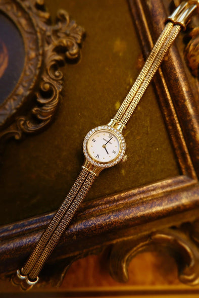 Audemars Piguet 18 Karat Gold white dial ladies watch full-set with original box and paper