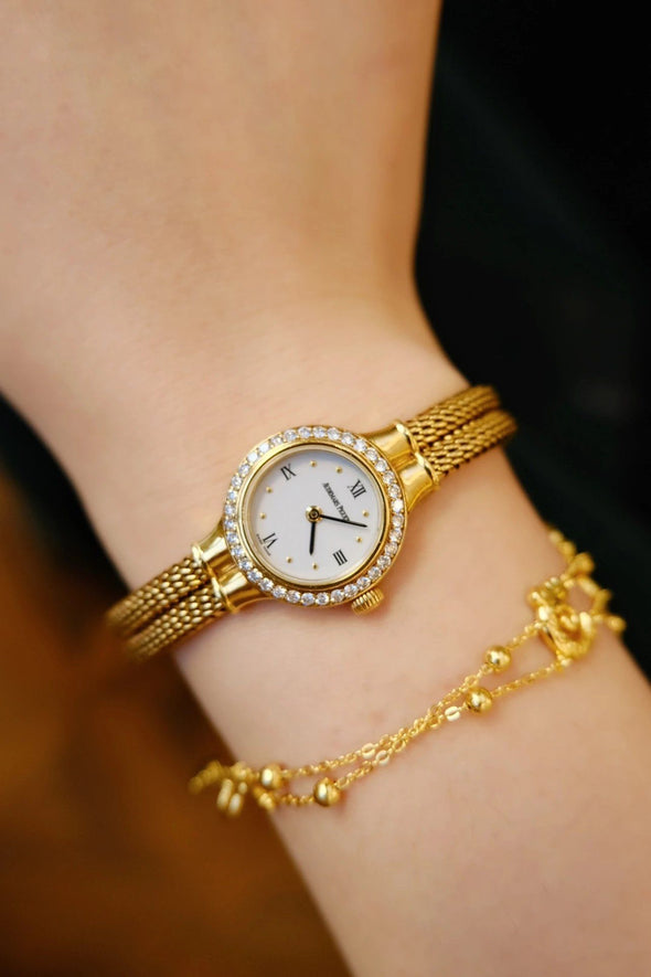 Audemars Piguet 18 Karat Gold white dial ladies watch full-set with original box and paper