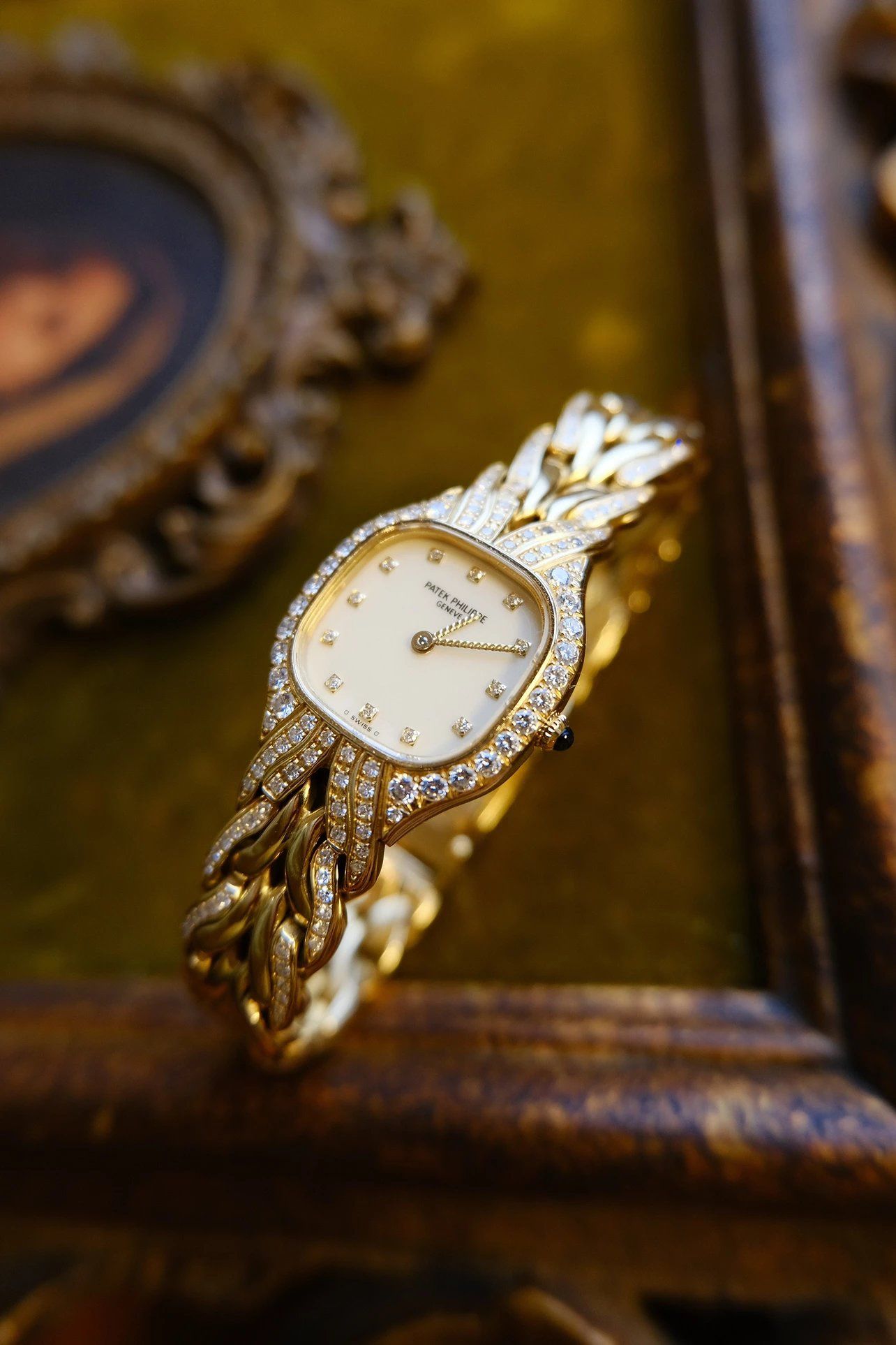 Patek Philippe 18ct gold La Flamme bracelet watch mayfairwatch