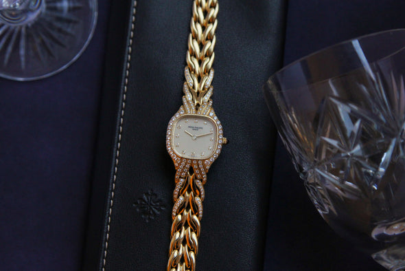 PATEK PHILIPPE 18ct gold La Flamme bracelet watch