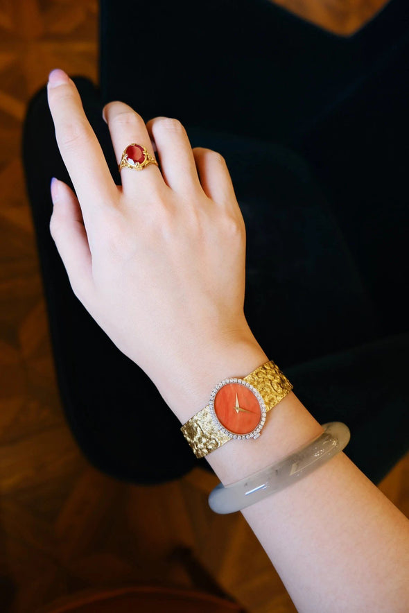 Piaget Orange dial 18 Karat Gold cocktail watch 1970S