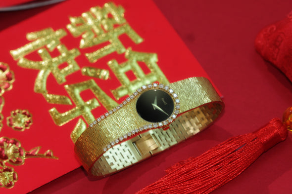 Piaget Yellow gold and diamond-set bracelet watch with onyx dial, Circa 1980