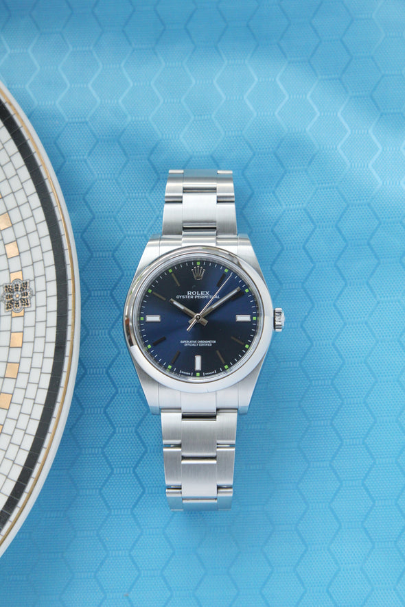 Rolex Oyster Perpetual 114300 Blue Dial 2019 Full-set watch