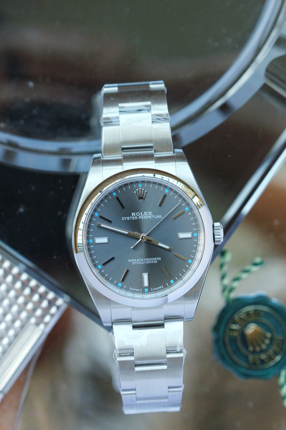 Rolex Oyster Perpetual 114300 Grey Dial 2017 Full-set watch