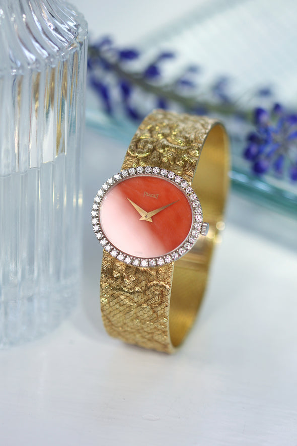 Piaget Orange dial 18 Karat Gold cocktail watch 1970S